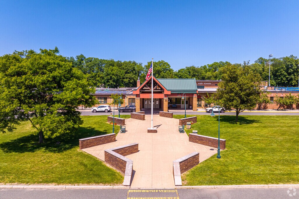 Students enter through the scenic front entrance of James Caldwell High School.
