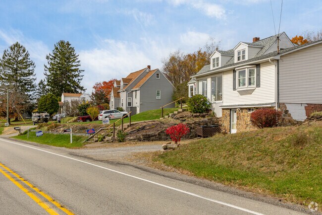 A row of contemporary homes sit on 7th Street in Upper Burrell Township.