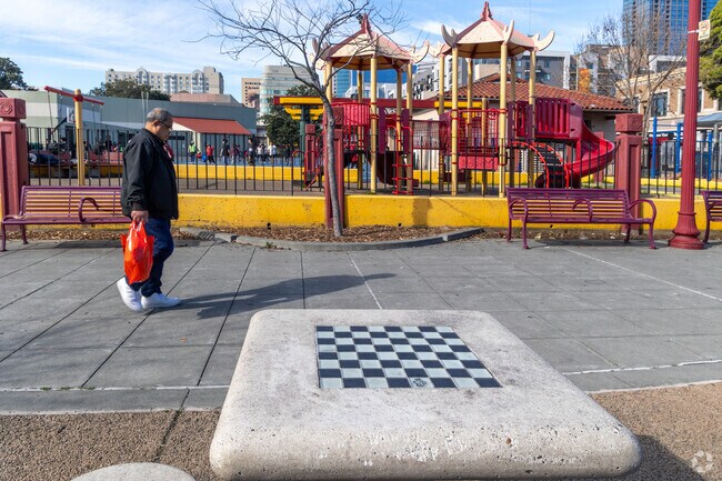 Locals meet at Lincoln Square Park for chess matches.