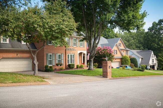 Brick mini mansions line this Stuart Heights-Rivermont street.