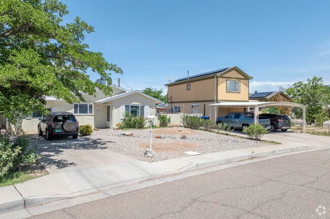 A two-story home rises above its xeriscaped yard in South Los Altos.