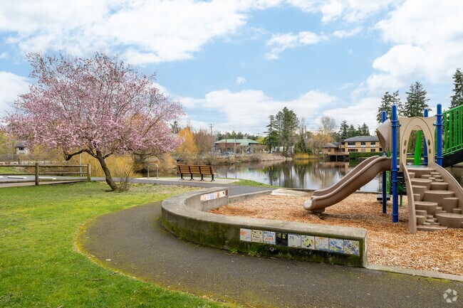 Sprague's Pond Mini Park in Lynnwood features a small playground and benches.