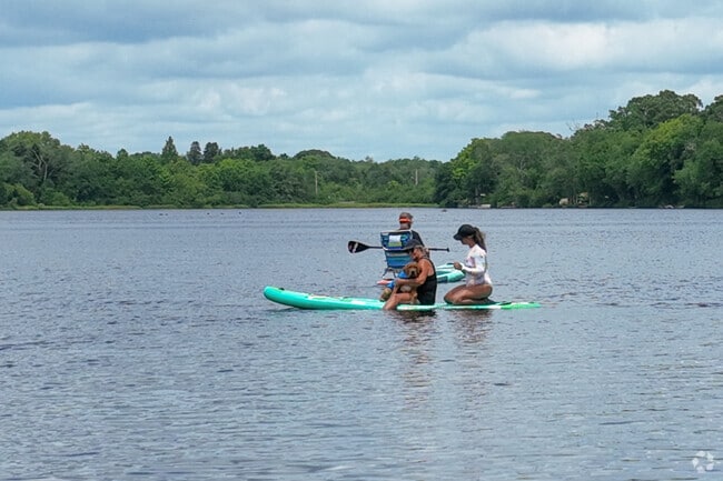 Some residents of Egg Harbor Township visit the nearby pond to relax by the water.