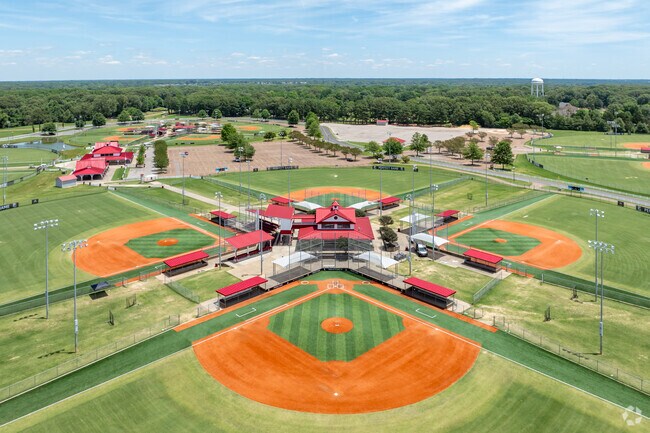 Cheer on the team at one of the 17 baseball fields at Snowden Grove Park in Southaven.