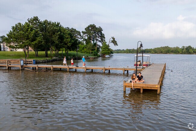 After a dinner at Sharky's Waterfront Grill, head over the pier to enjoy the sunset in Kingwood.