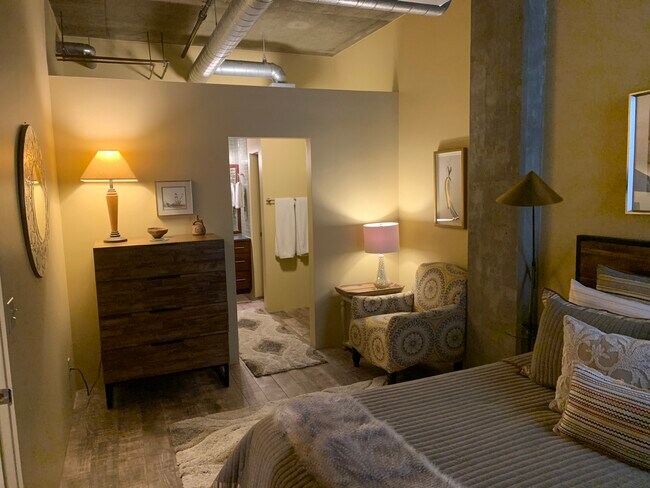 View into closet and bathroom in master bedroom