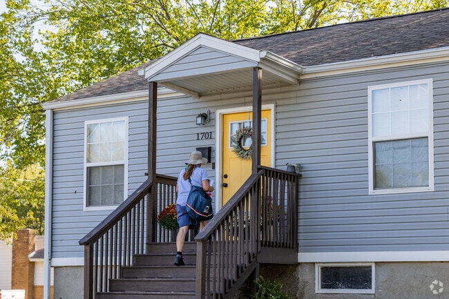 Mail carriers hand deliver the packages and letters to homes throughout Blendville North.