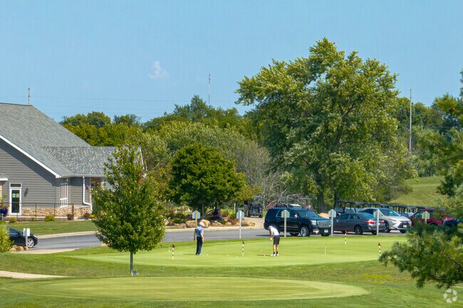 The putting area at the Piper Glen golf course makes a great spot to warm up before a game.