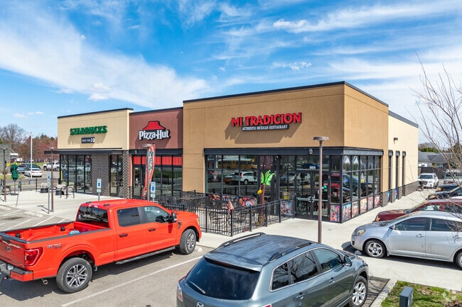 Chain and fast-food restaurants like Starbucks and Pizza Hut line South Hamilton Road.