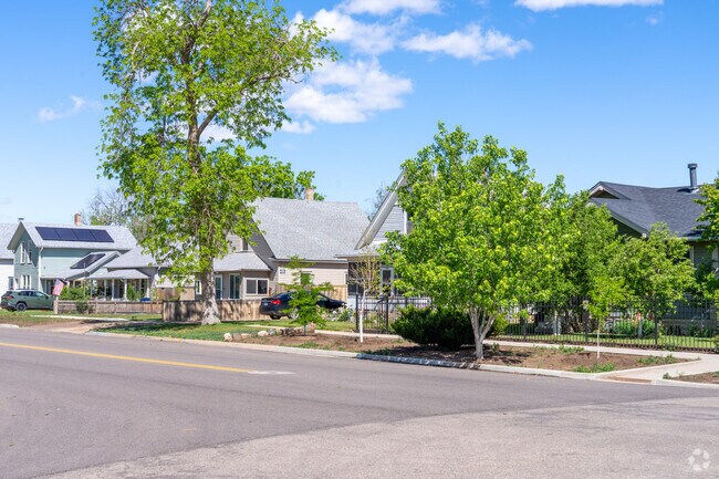 A row of Victorian-style bungalows in Clayton Park adds vintage charm with detailed trim, cozy porches, and classic neighborhood appeal.