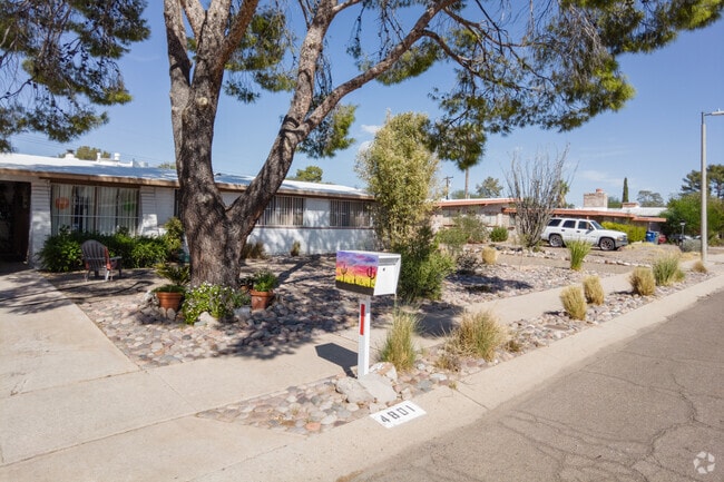 A colorful mailbox fronts a row of ranch homes in Glenn Heights Tucson.