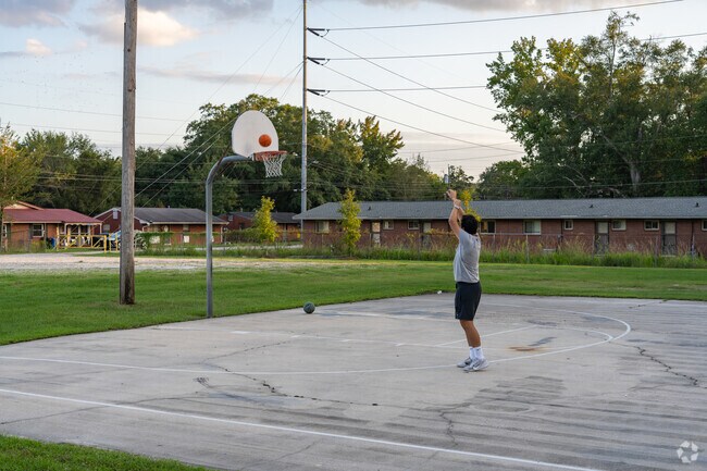 Carver Heights head to Boxwood Park for afternoon games of pick up basketball.