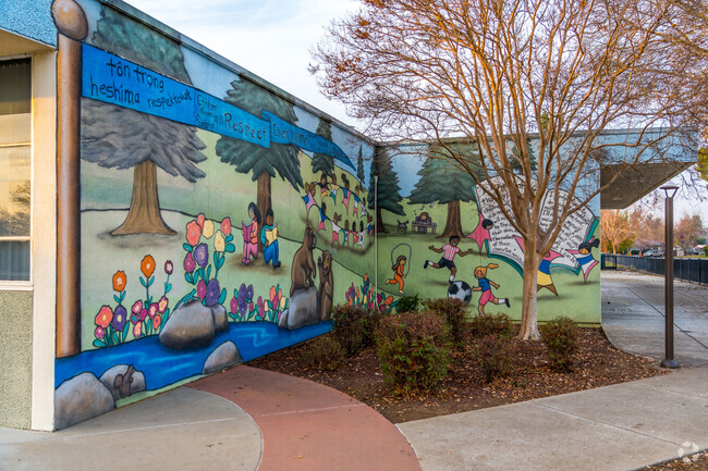 Cordova Meadows Elementary School has a vibrant mural on the side of the office building.