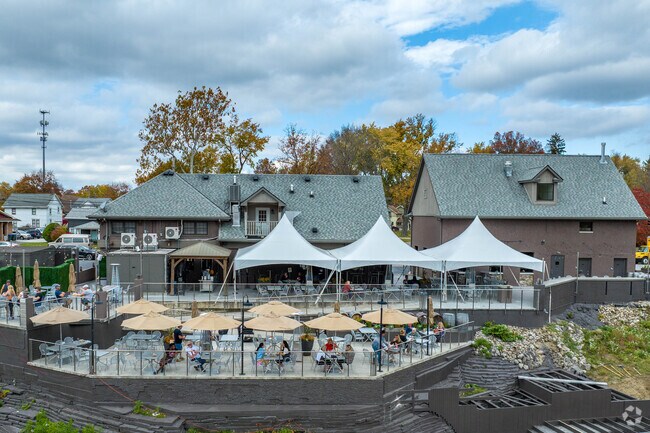 Missing Mountain Brewery features a great deck, perfect for enjoying a pleasant day near the Cuyahoga View neighborhood.