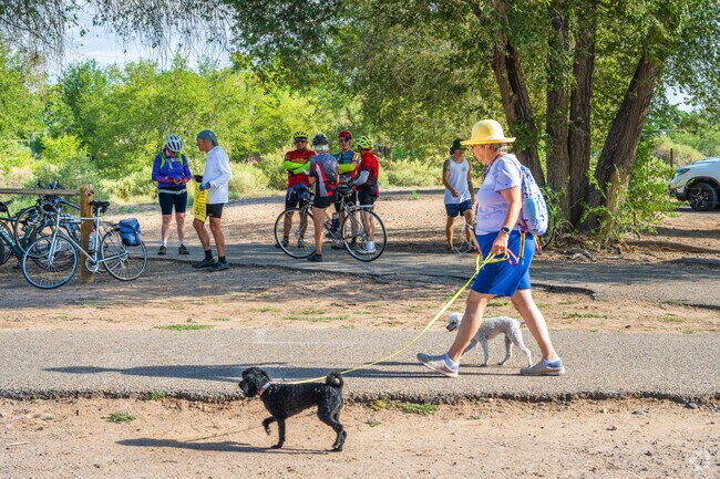 Walkers and cyclists share the 16-mile Paseo del Bosque Trail.