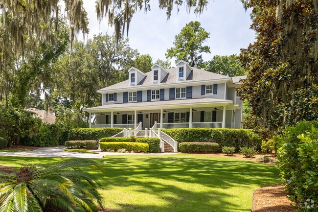 Beautiful southern home, complete with ceiling fans on the porch.
