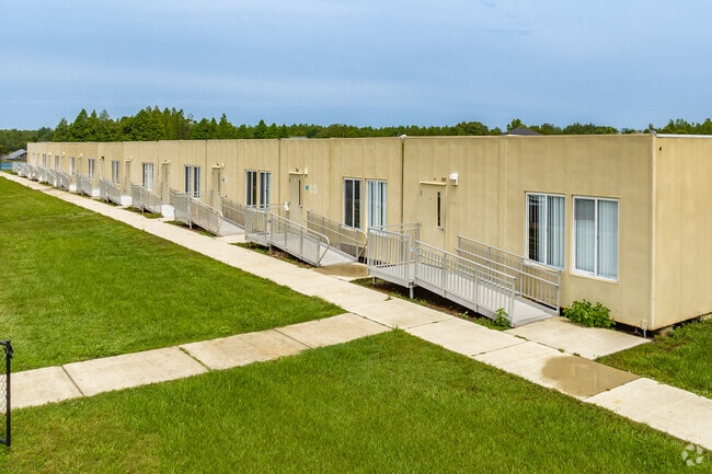Sunlake High School handles extra students with up to date portable classrooms.