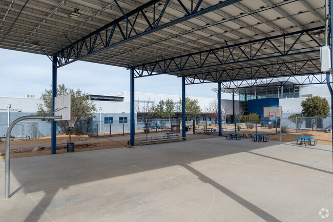 Students love playing basketball on the covered court at Andrada Polytechnic High School.