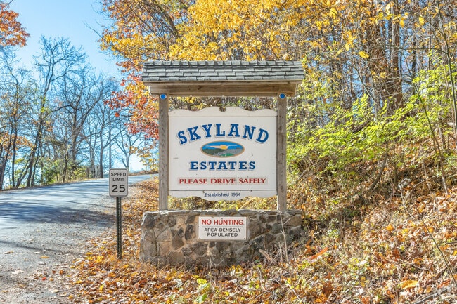 Skyland Estates welcomes residents to its secluded mountainside community.
