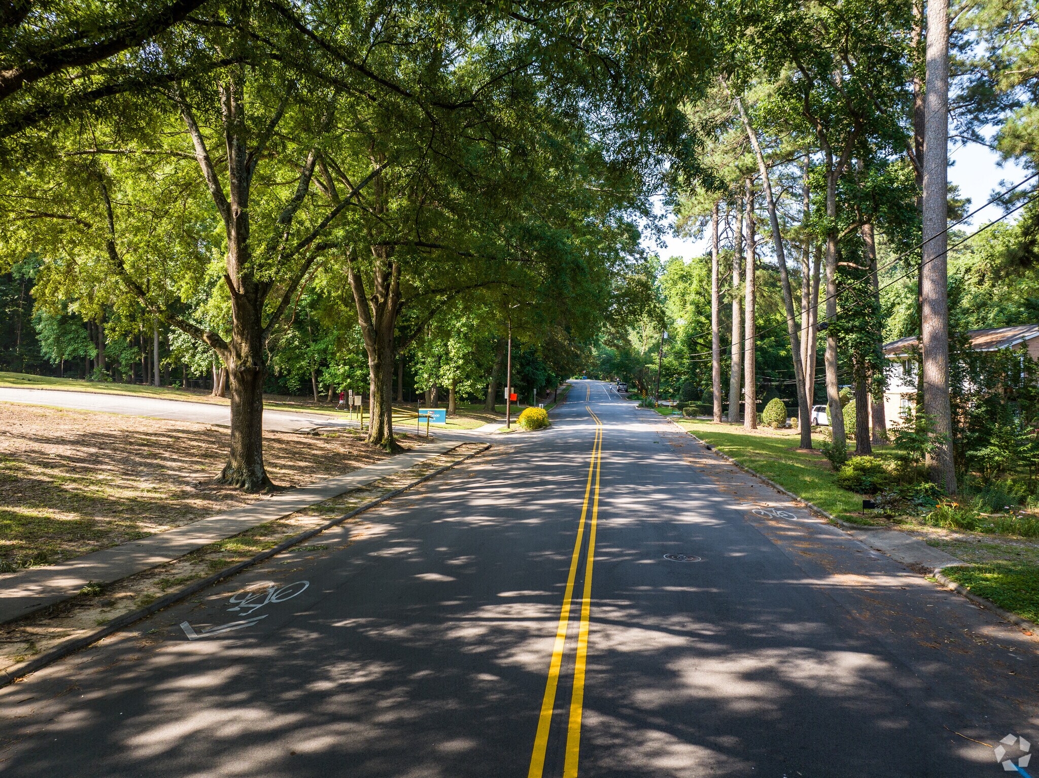 Tall oak trees help shade the home in the Belvedere Neighborhood.