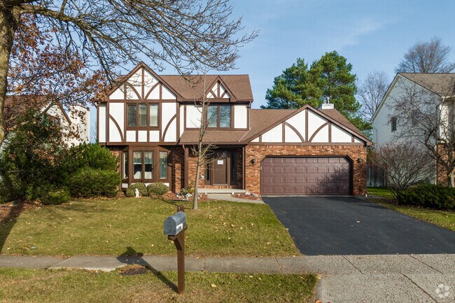 This Tudor-style home in East Amherst shows one of the many architectural styles present.