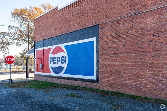 Old murals are getting new life with a fresh coat of paint in the Micro, NC.