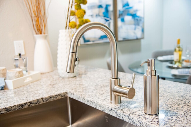 Kitchen with granite counters & stainless finishes