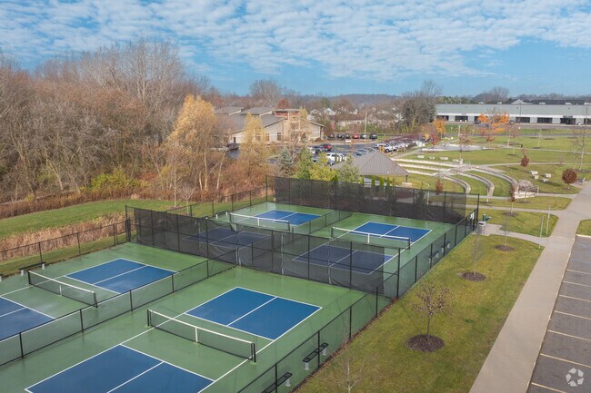The Caledonia Community Green features a pavilion, amphitheater and pickleball courts.