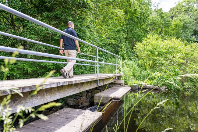Indulge in a serene nature walk with stunning pond views at Frenchtown Park in Shippeetown, RI.