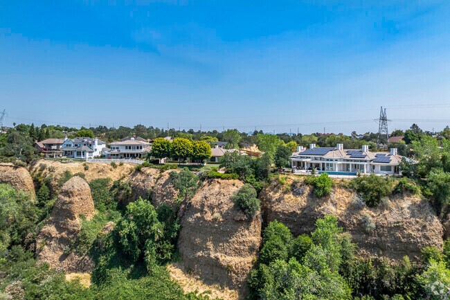 Living on the edge is some estate homes in Bluffs.