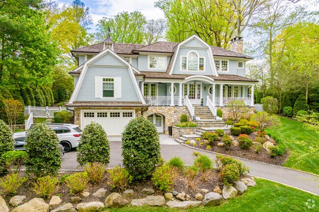 Colonial style homes are featured prominently throughout the hills of  Roslyn Estates.