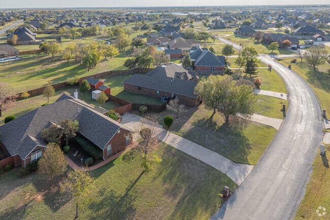 In Pecan Valley South, residents appreciate the large homes set amid dense, ancient trees.