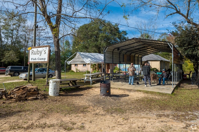Ruby’s Fish Camp in Beulah serves classic seafood in a rustic riverside setting.
