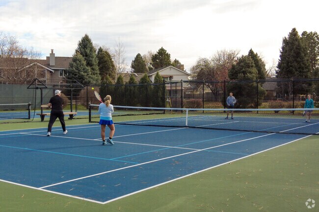 Enjoy a game of tennis or pickleball at the Heritage Greens swim and tennis club.