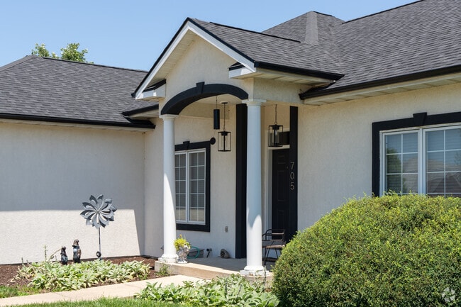 One detail most homes in Bedford Walk share is columns flanking their front doors.