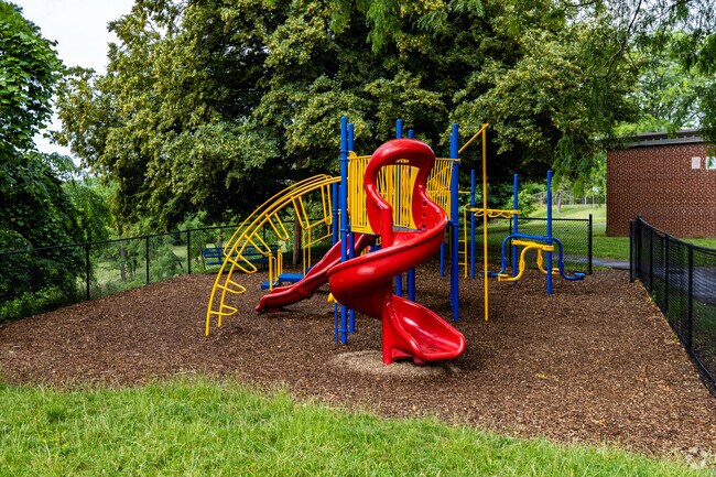 Kids can play hard at the tot-lot at Clara Barton Elementary School in West Mifflin.