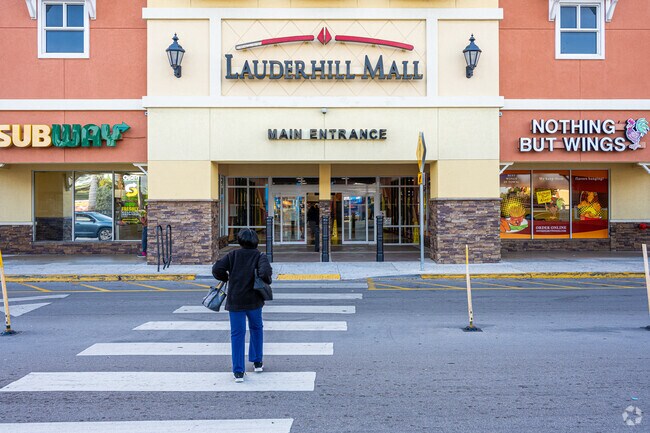 Twenty-five steps away from the Lauderhill Transit Center to Lauderhill Mall.