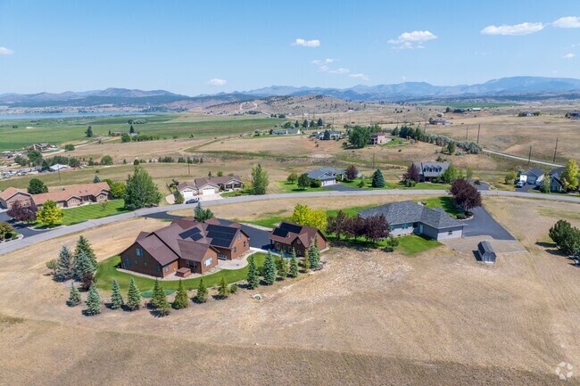Large homes on of different styles grace East Helena Valley.