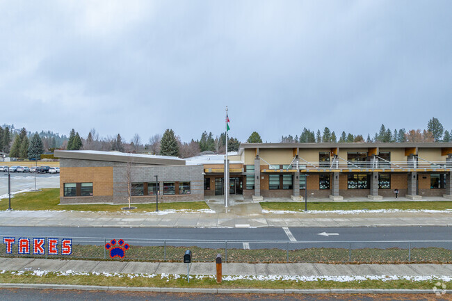 Ponderosa Elementary features a large brick building.