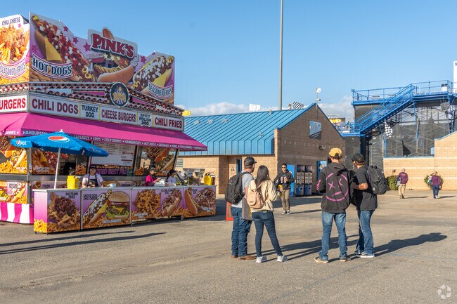 You'll experience the thrill of racing and delicious food options at Perris Auto Speedway.
