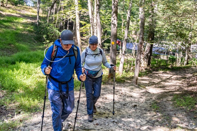 Visitors enjoy hiking the trails at Audra State Park near Philippi.