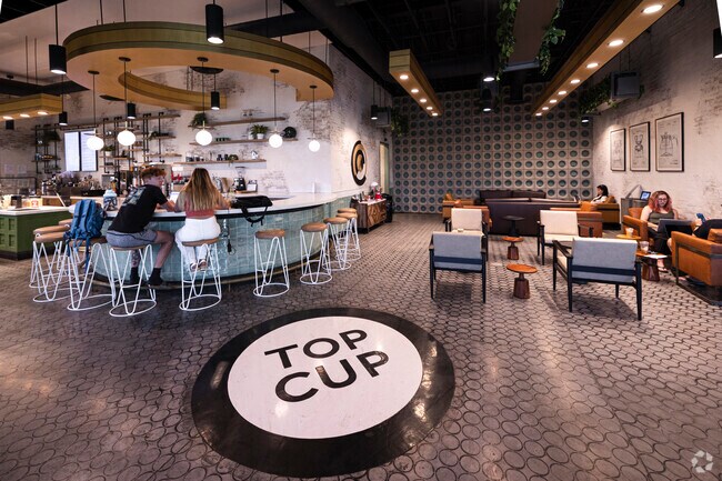 Top Cup Coffeouse in Sun Groves is a favorite spot to work and grab a coffee.
