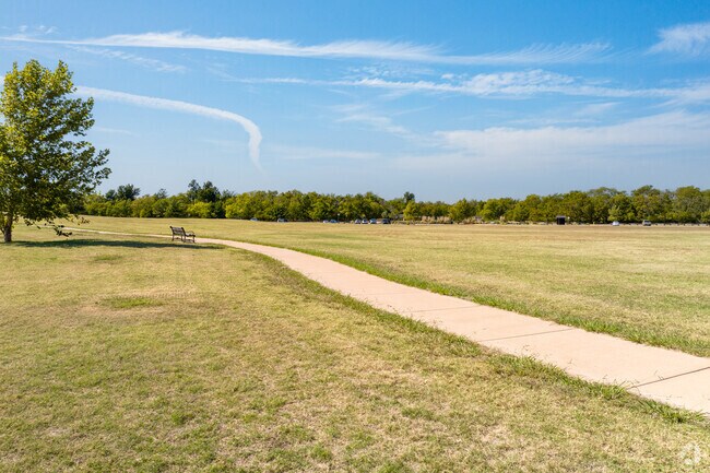 Enjoy a walk through the paths at Bluff Creek Park in Fox Run.