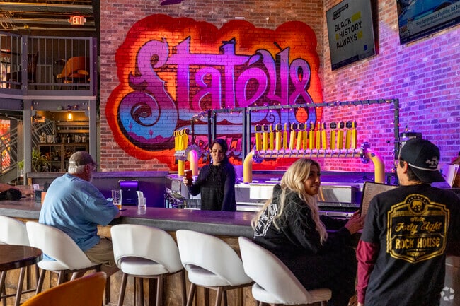 Grab a Hot Chicken Sandwich and a local brew at State 48 Rock House near North Deer Valley.