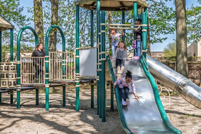 A group of kids plays on the Wiegland Park playground near Nortown.