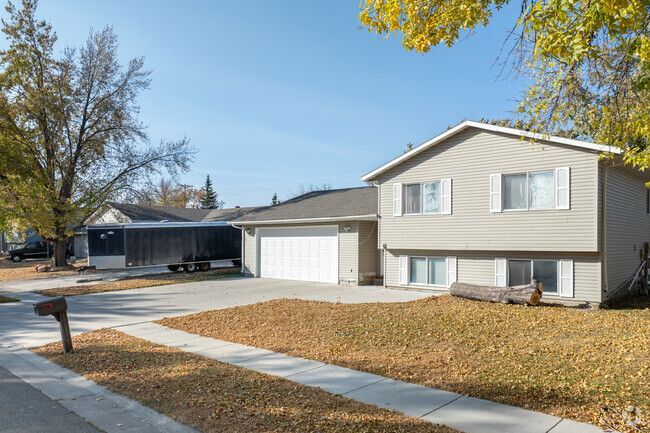Mature trees decorate the yards of West Fargo's quaint Pinewood neighborhood.