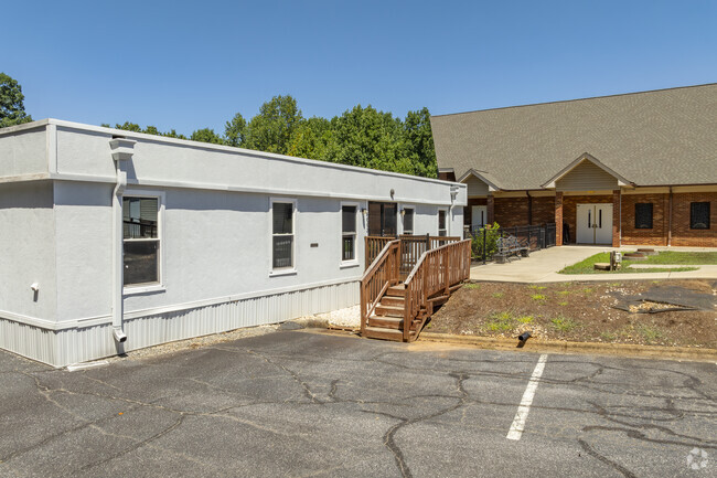There are temporary buildings that house the classrooms for Christian Family Academy students.