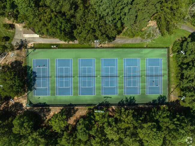 Tennis near Cross County practice at Five Oaks Club.