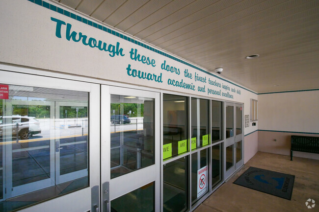The entrance of Lewis Carroll Elementary School has an inspirational quote.