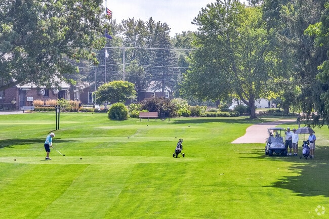 Sandy Hollow near Pine Manor offers both golf and a driving range.